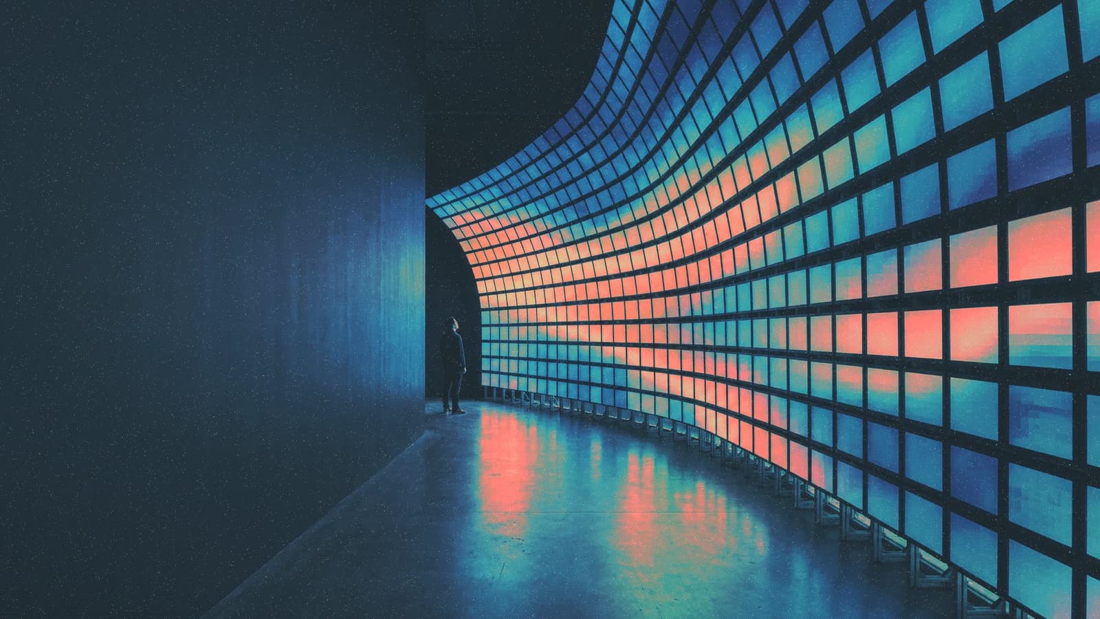 A curved wall of illuminated blue and coral panels.