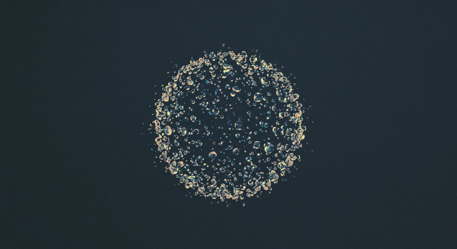 A sphere of small illuminated particles suspended in a dark space.