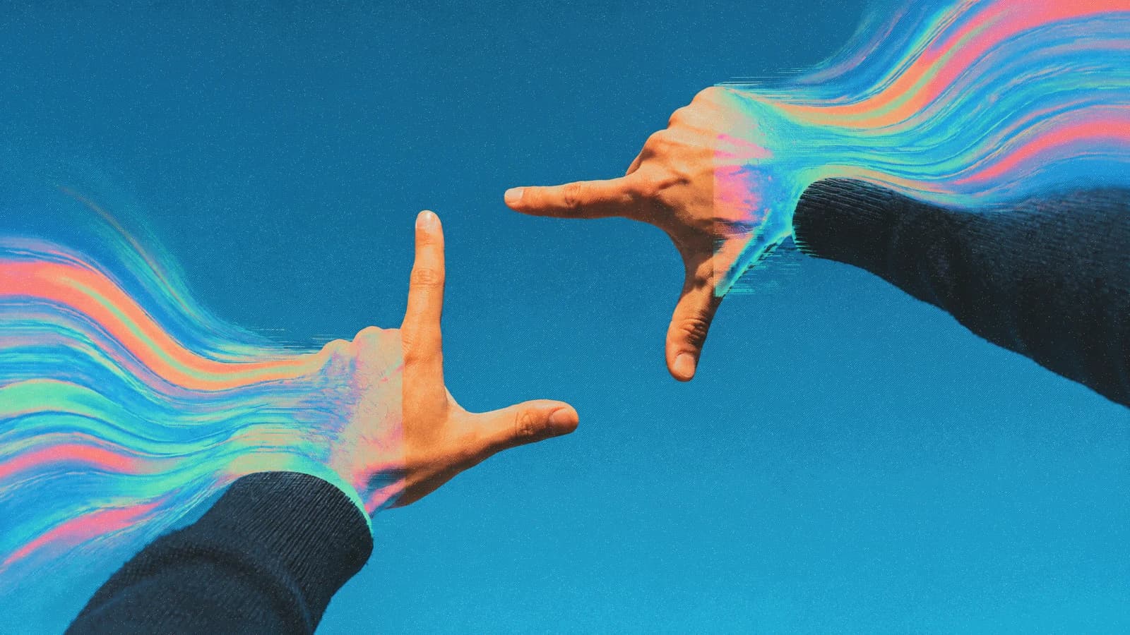 Two hands framing a blue sky with flowing coral and green trails.